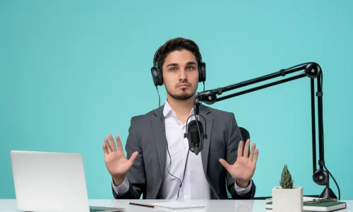 blogger-journalist-serious-cute-handsome-guy-recording-video-grey-suit-stopping-hands blogger-journalist-serious-cute-handsome-guy-recording-video-grey-suit-stopping-hands